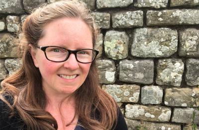 Art and art history department Chair Cynthia Bland at Hadrian's Wall in Scotland.