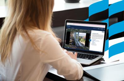 A woman navigates UW-Stout's virtual tour portal from her laptop.