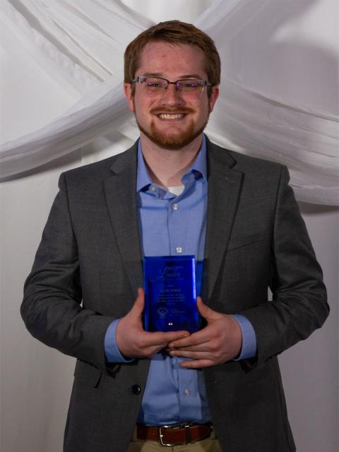 Devin Dumke with his Leadership Award.