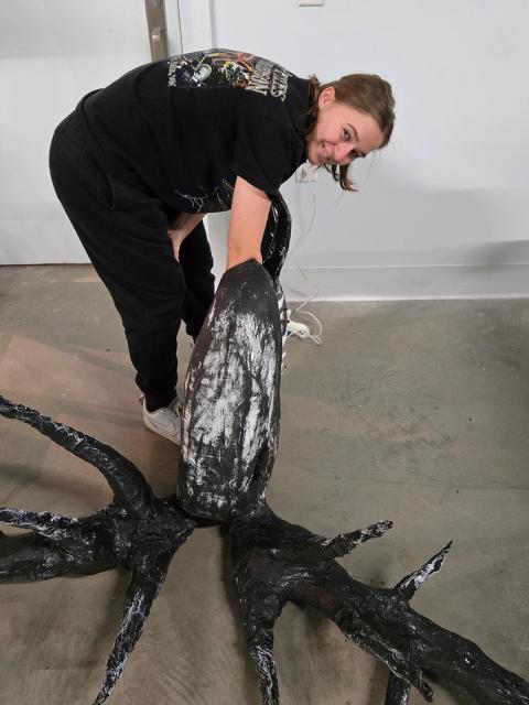 Renae van der Hagen assembling Disquiet Dream sculpture