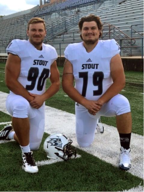 Two men in football uniforms