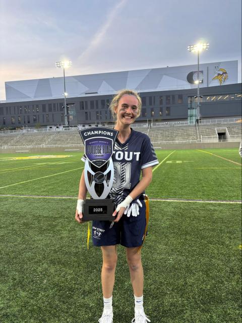 Woman holding trophy
